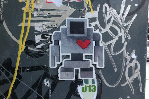 Lovebot sticker on a wall
